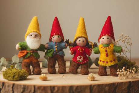 Four felt gnome figurines 
