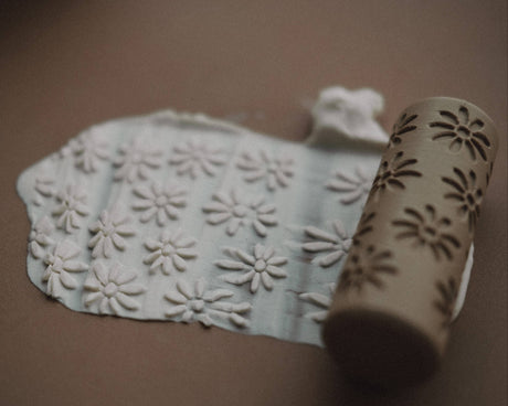 Eco playdough roller with daisy patterns