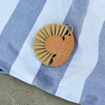 Beach Brush Sand Remover_on towel